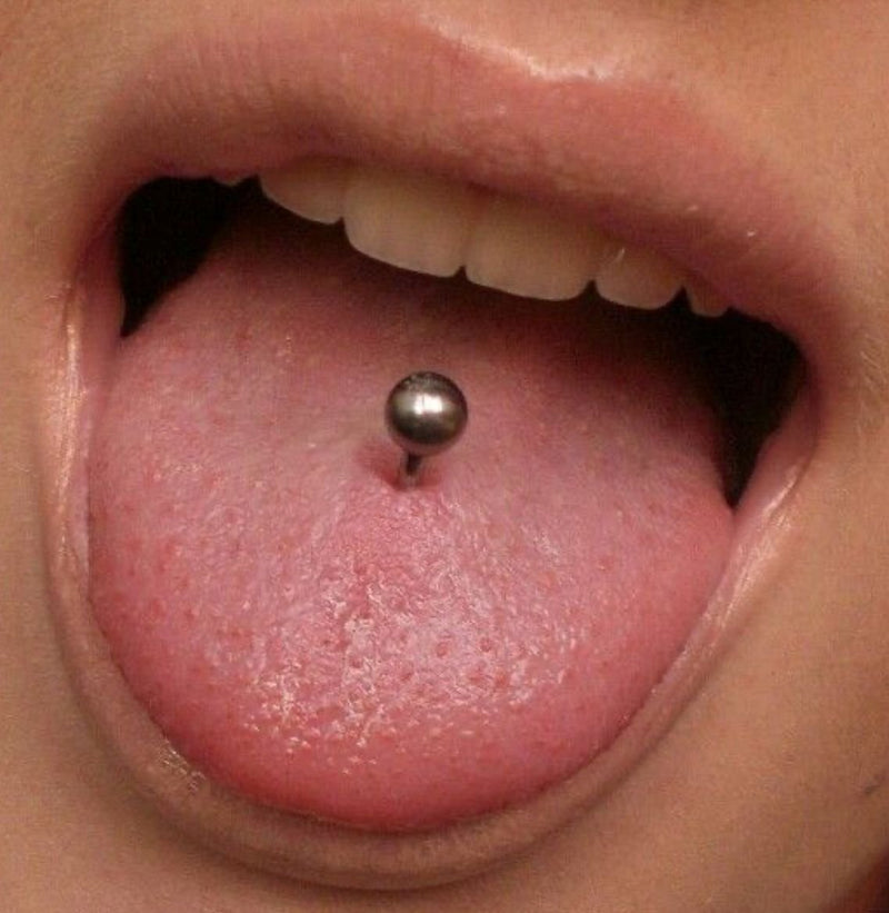 Tongue piercing closeup